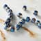 12 Packs: 19 ct. (228 total) Blue Ceramic Round Melon Beads, 9mm by Bead Landing™